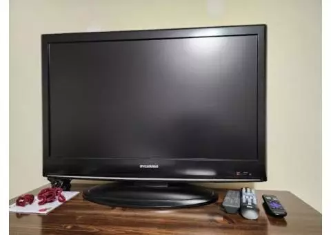 A 32 in Sylvania Color TV with base