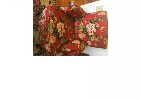 Red Floral fabric cushioned wing back chair